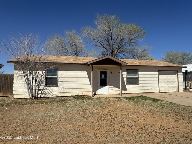 6210 22nd St, Lubbock, TX 79407 - ranch-style home featuring an attached garage and driveway