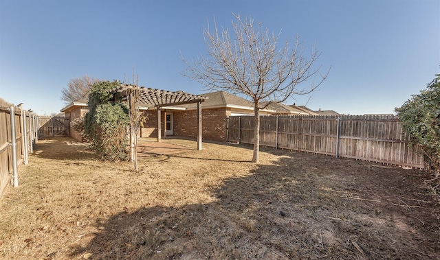 view of yard with a pergola