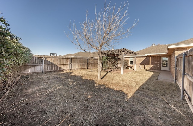 view of yard with a pergola