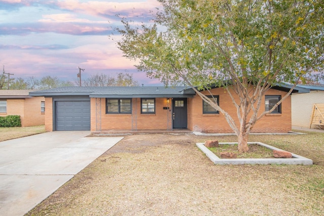 single story home with a garage