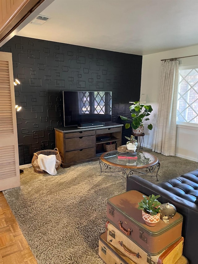 living room featuring parquet floors