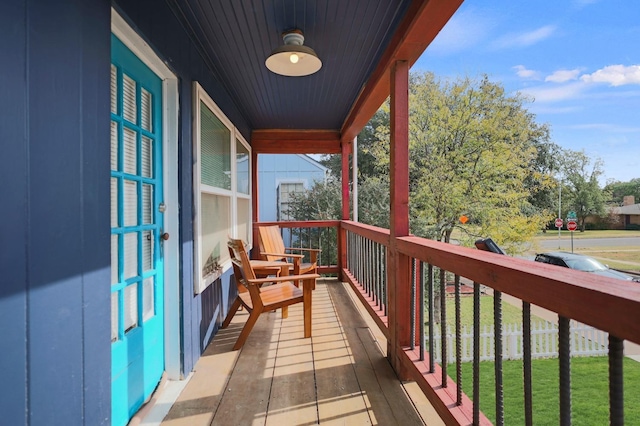 balcony featuring a porch