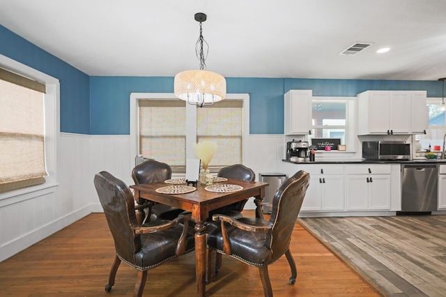 dining area featuring hardwood / wood-style flooring