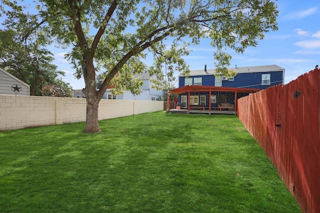 view of yard featuring a deck