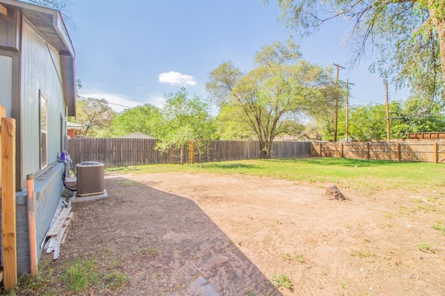 view of yard with central AC unit