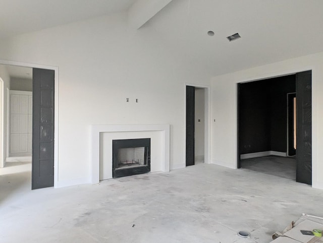 unfurnished living room with lofted ceiling