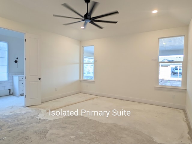 empty room featuring ceiling fan, recessed lighting, and baseboards