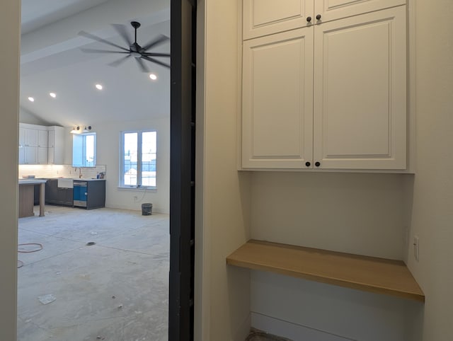 interior space featuring tasteful backsplash, ceiling fan, vaulted ceiling, vanity, and recessed lighting