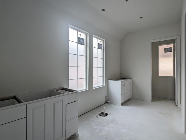 clothes washing area with plenty of natural light