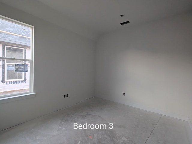 unfurnished room with a healthy amount of sunlight