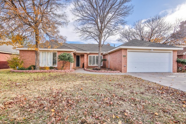 single story home with a garage and a front yard