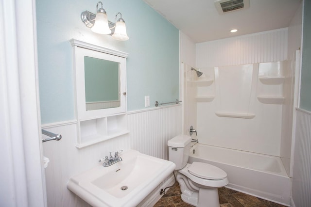 full bathroom with tub / shower combination, sink, and toilet