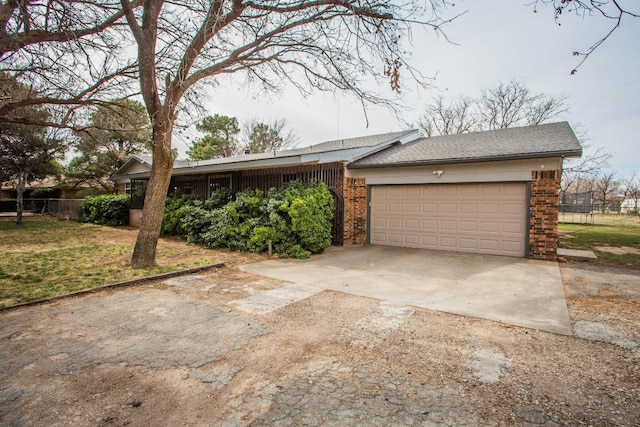 ranch-style house with a garage