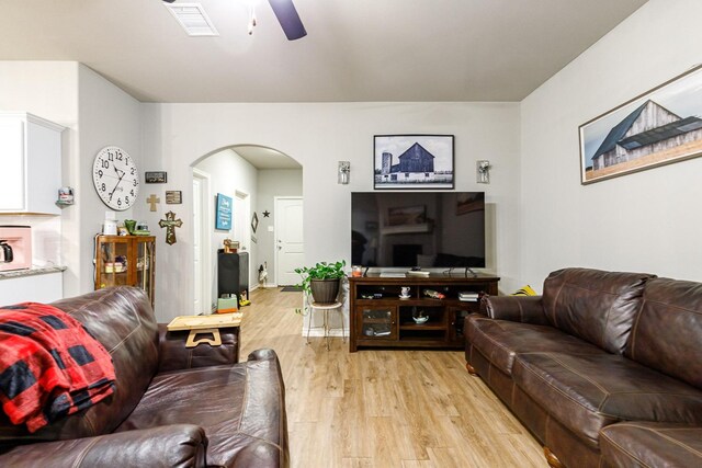 2541 137th St, Lubbock, TX 79423 - living room featuring ceiling fan and light wood-type flooring