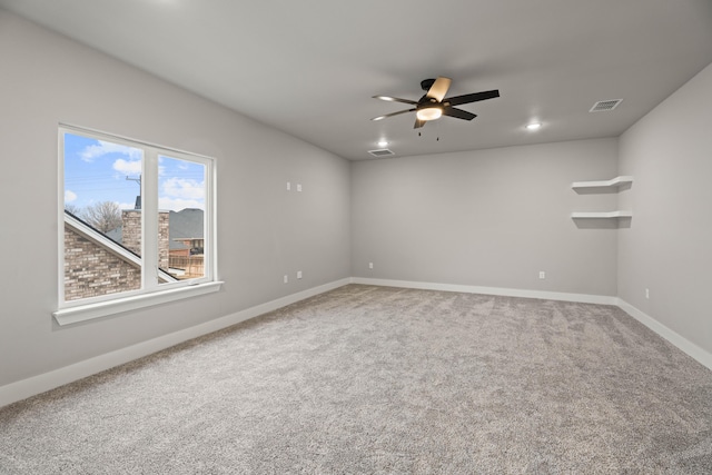 carpeted empty room with baseboards, recessed lighting, visible vents, and a ceiling fan