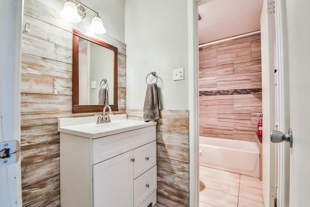 bathroom featuring tile patterned flooring and vanity