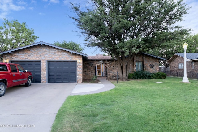 2512 Holliday Dr, Plainview, TX 79072 - single story home featuring an attached garage, brick siding, and driveway