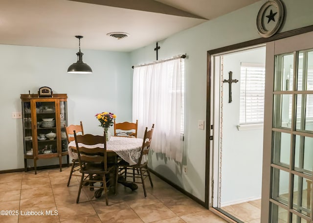 2512 Holliday Dr, Plainview, TX 79072 - dining room featuring light tile patterned floors