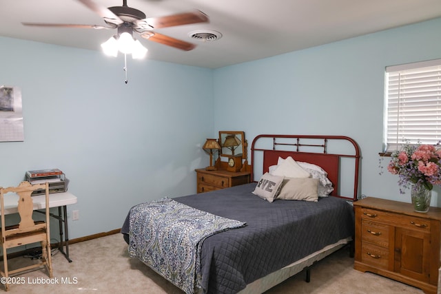2512 Holliday Dr, Plainview, TX 79072 - bedroom with carpet flooring and a ceiling fan