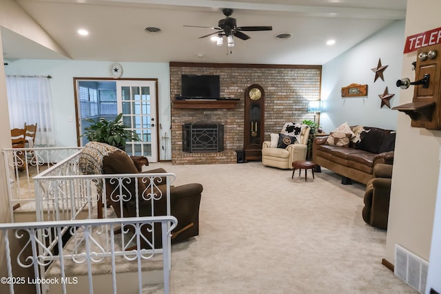 2512 Holliday Dr, Plainview, TX 79072 - living area with carpet, a brick fireplace, and ceiling fan