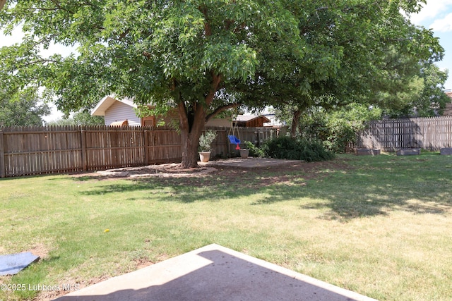 2512 Holliday Dr, Plainview, TX 79072 - view of yard featuring a patio