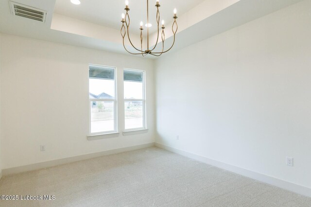 7450 55th St, Lubbock, TX 79407 - carpeted empty room with a chandelier, baseboards, a raised ceiling, and recessed lighting