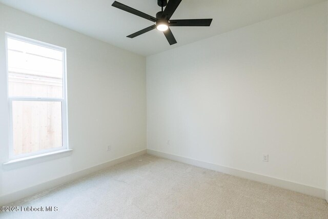 7450 55th St, Lubbock, TX 79407 - carpeted spare room featuring a ceiling fan and baseboards