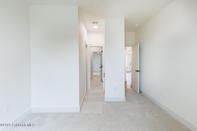 7450 55th St, Lubbock, TX 79407 - unfurnished bedroom with light colored carpet and baseboards