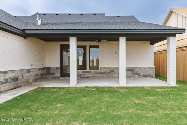 7450 55th St, Lubbock, TX 79407 - rear view of property featuring a patio area, a shingled roof, brick siding, and a ceiling fan