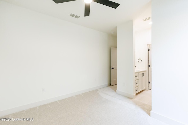 7450 55th St, Lubbock, TX 79407 - empty room with light carpet, ceiling fan, and baseboards