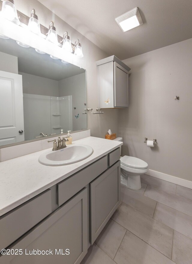 3202 Venita Ave, Lubbock, TX 79407 - bathroom with vanity and toilet