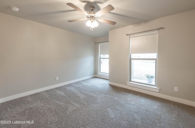 3202 Venita Ave, Lubbock, TX 79407 - spare room featuring a smoke detector, carpet, and ceiling fan