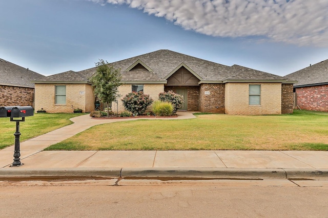 ranch-style house with a front lawn