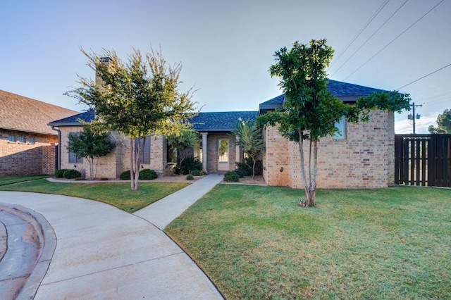 view of front of house with a front lawn