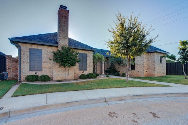 view of front of house with a front lawn