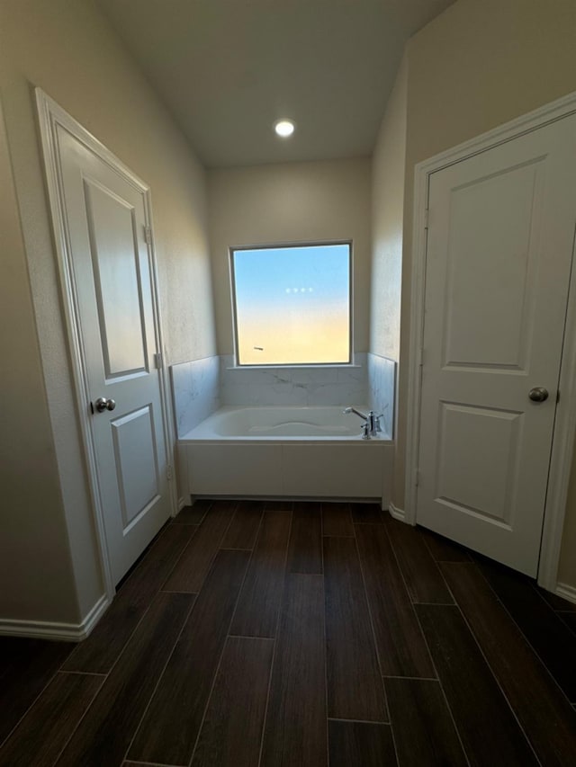 bathroom with a washtub