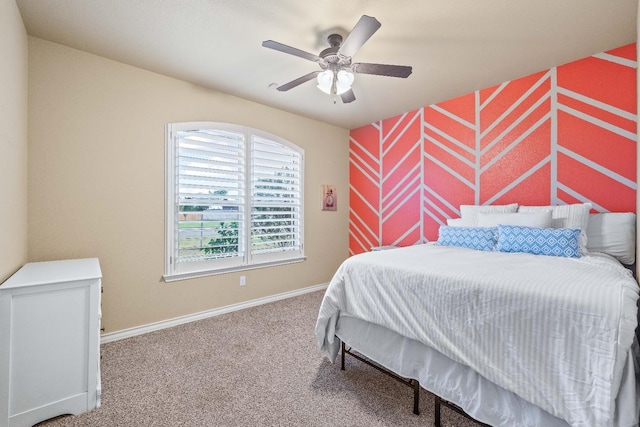 bedroom with ceiling fan and carpet