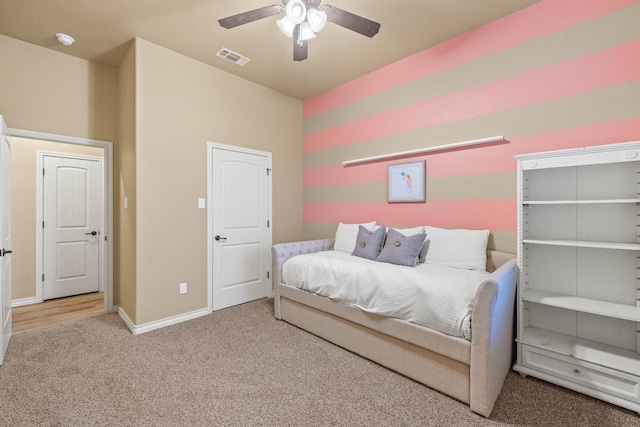 bedroom featuring carpet floors and ceiling fan