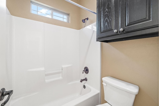 bathroom with  shower combination and toilet