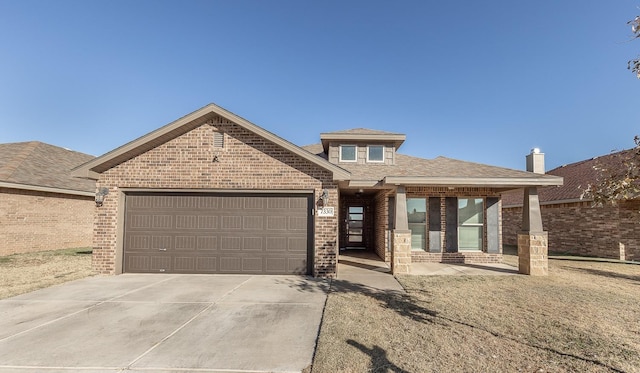 view of front of home featuring a garage