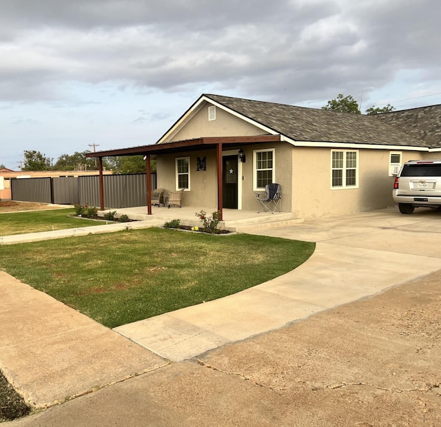 view of front of home with a front lawn