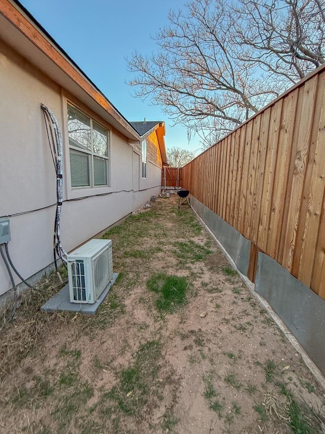 view of yard featuring ac unit