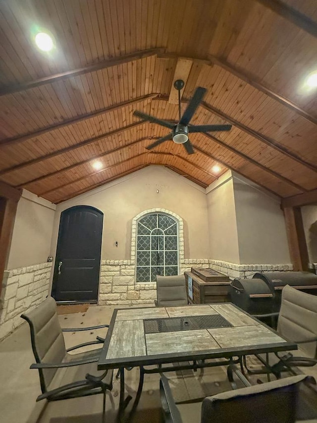 interior space with ceiling fan