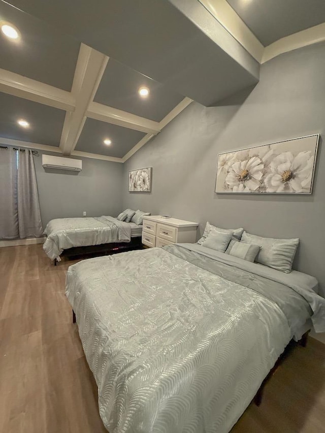 bedroom with coffered ceiling, a wall mounted air conditioner, beam ceiling, and hardwood / wood-style floors