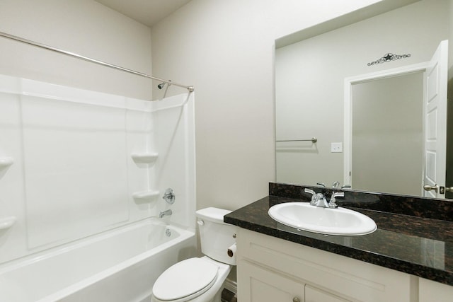 full bathroom featuring  shower combination, toilet, and vanity