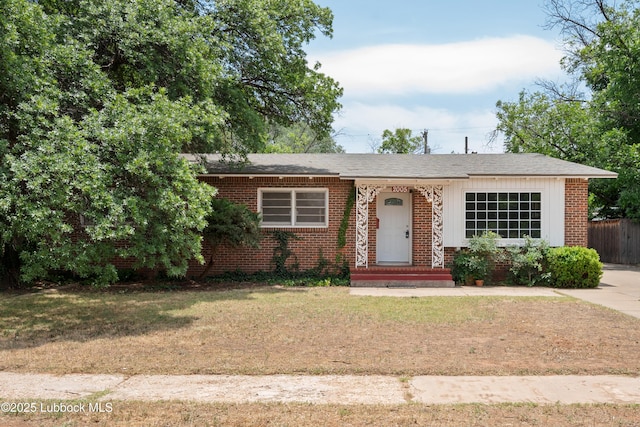2005 32nd St, Lubbock, TX 79411 - view of front of house featuring brick siding