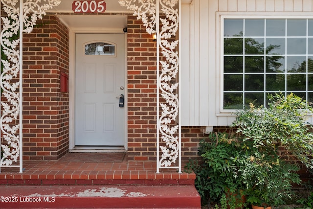 2005 32nd St, Lubbock, TX 79411 - property entrance featuring brick siding