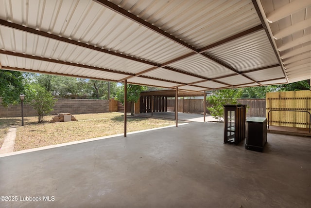 2005 32nd St, Lubbock, TX 79411 - fenced backyard with a patio area