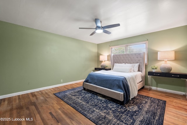 2005 32nd St, Lubbock, TX 79411 - bedroom featuring wood finished floors, baseboards, and ceiling fan