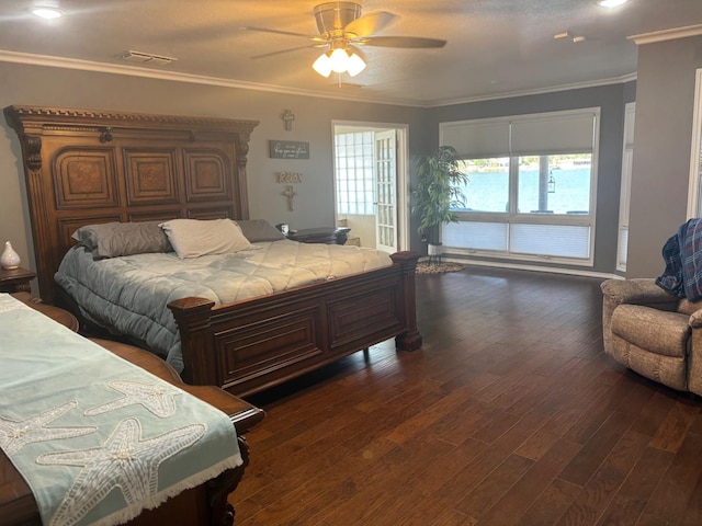 bedroom with ornamental molding, dark hardwood / wood-style floors, and ceiling fan